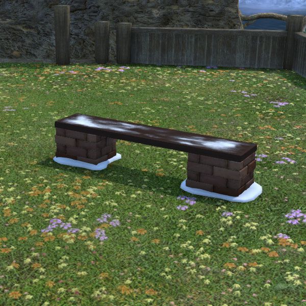 Banc en briques rouges enneigé